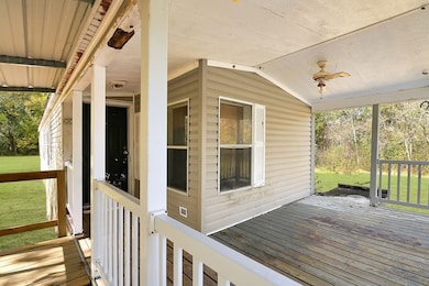 Enjoy coffee on the covered porch.