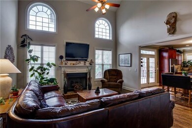 The great room with the vaulted ceiling and high w
