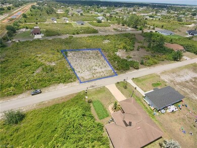 Aerial view of property and surrounding area with 