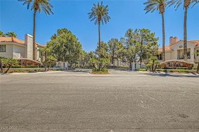 View of asphalt street featuring a residential vie