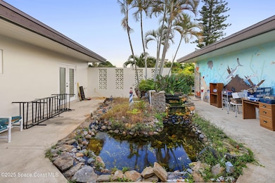 1132 Pine Tree Dr, Satellite Beach, FL 32937 - photo 3