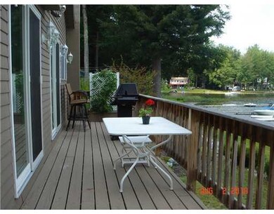 Expansive deck along lake side of...