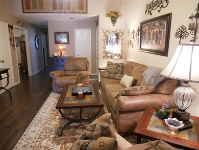 Living area featuring dark wood finished floors a