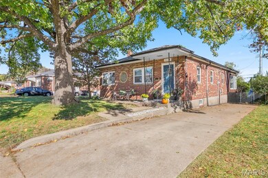 Ranch-style house featuring brick siding and a chimney