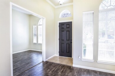 Front entry into formal living/dining with study/4th bedroom to the left
