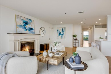 Living area with visible vents, recessed lighting