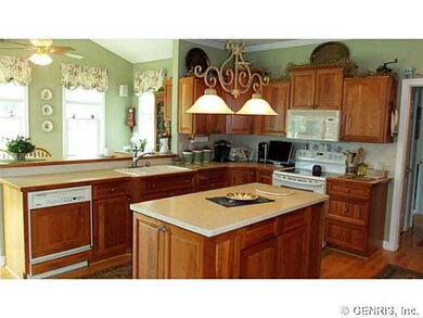 Kitchen Cherry cabinets, hardwood floors & island