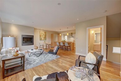 A sprawling open concept entertainment area greets