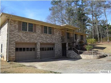 Home has double garage doors.