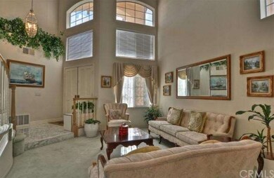 Home feautures double door entry and marble foyer 