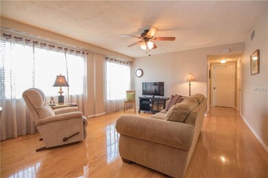 Nice and bright living with gleaming hardwood