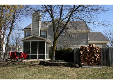 Exterior Back. Park-like back yard with screened porch is fully fenced.