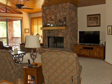 Great Room with Towering Rock Fireplace