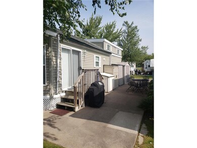 Huge patio with table and chairs, a pull out awnin