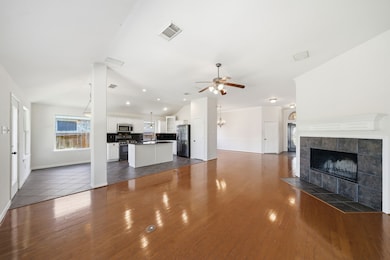 Living space flows great to kitchen and breakfast area.