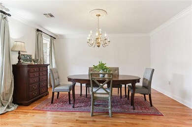 Large Formal Dining Room with an entryway into to the Kitchen