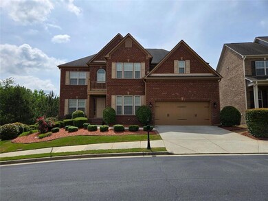 Stately curb appeal in the gated Lakes at Sugarloaf