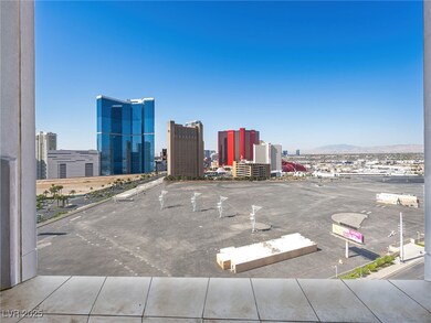 View of parking / parking lot featuring a city vie