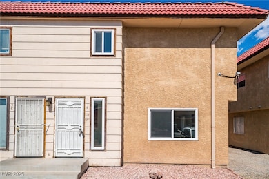 View of front of house with stucco siding