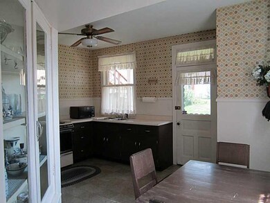 Kitchen. Main Kitchen, door to back porch and larg