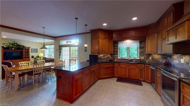 Updated Eat in Kitchen, with Maple cabinets,granit