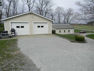 Exterior Front. upper and lower garages (8 car tot