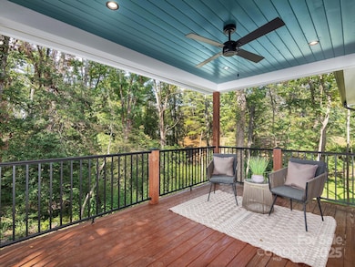 Spacious and private back porch extends living space outdoors