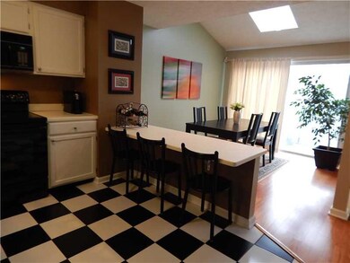 Kitchen. Dine at the convenient breakfast bar in t