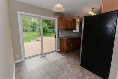 Off the kitchen is the dining room.  The sliding g