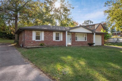 An added asphalt driveway on the left side of the home as well