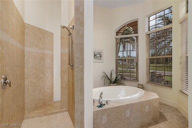 Master Bath with walk-through shower at 1815 NW 38th Ave, Cape Coral FL