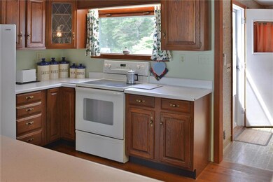 Kitchen view with side door entry.