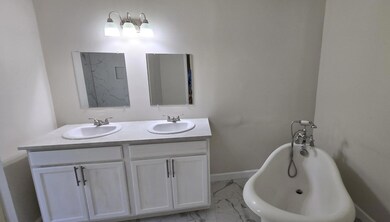 dual sinks claw foot tub
