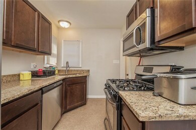 Kitchen with granite countertops.