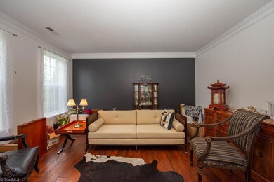 Formal Living room with accent wall