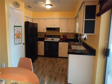 Kitchen showing the abundance of cabinets, as well