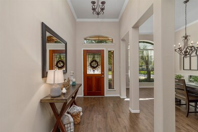 Open entry with upgraded tile floors from front to back of home.