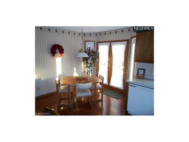 Dinette off of Kitchen with French Doors to Deck