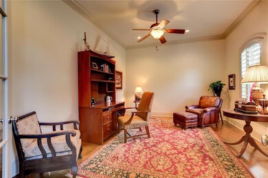 STUDY W/GLASS FRENCH DOORS AND PLANTATION SHUTTERE