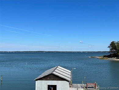 Water view with a dock