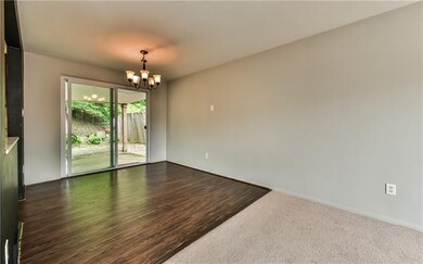 Dining room with sliders to covered patio area.