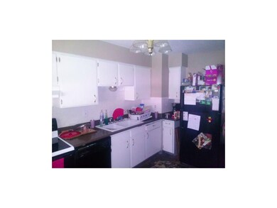 Kitchen, newer countertops, needs flooring