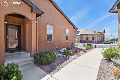 Property entrance with stucco siding