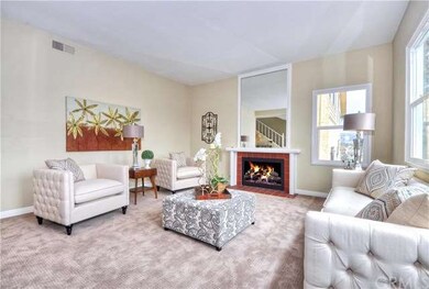 Living room has new upgraded carpet and a gas fire