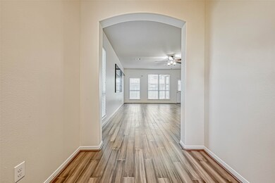 This is your view as you enter this beautiful home.  Bamboo wood floors.
