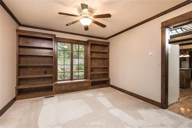 Sitting room adjacent to kitchen and dining room. 