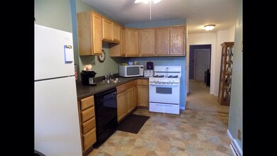 Lovely updated kitchen with newer flooring, counte