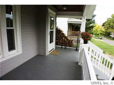 Exterior Front. Pretty front porch to sip your mor