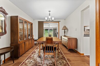 Dining Room opens to the SUN ROOM