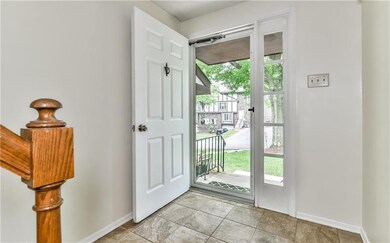 An inviting entry with ceramic tile flooring!